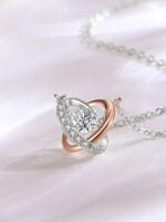 Celestial submissive necklace with orbit pendant and “Good Girl” engraving — a discreet D/s jewelry piece for daily wear, gifting, or ritual praise.