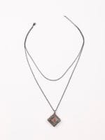 Daddys Little Slut necklace inside Black Gothic pendant engraved. A hidden message necklace for D/s dynamics, with dark romance and symbolism.