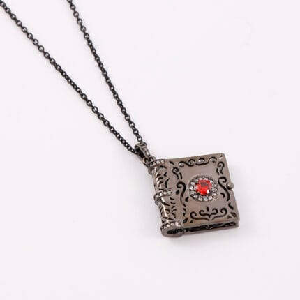 Daddys Little Slut necklace inside Black Gothic pendant engraved. A hidden message necklace for D/s dynamics, with dark romance and symbolism.