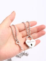 Lockable BDSM collar necklace with engraved heart pendant and matching key for submissive jewelry wear