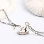 Lockable BDSM collar necklace with engraved heart pendant and matching key for submissive jewelry wear