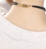 Sterling silver O-ring collar with soft flannel strap and Good Girl engraved clasp — a discreet BDSM day collar for subtle, daily submission and devotion.