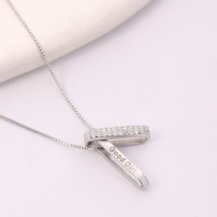Hidden message submissive necklace with pavé crystal loop and “Good Girl” bar — a discreet day collar necklace for elegant obedience and D/s gifting.