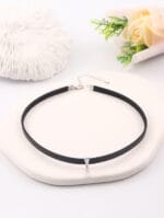 Discreet day collar with sterling silver pendant. A minimalist BDSM jewelry piece for daily submission. Subtle, elegant, and full of meaning.