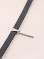 Discreet day collar with sterling silver pendant. A minimalist BDSM jewelry piece for daily submission. Subtle, elegant, and full of meaning.