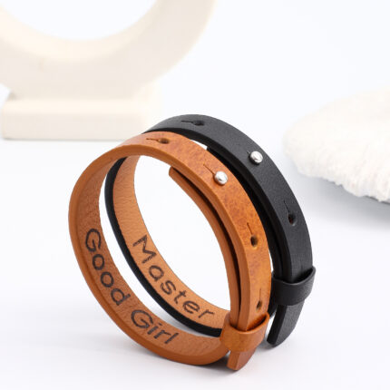 D/s couples bracelet set in leather with hidden engraving — discreet day collar set for long-distance, gifting, or daily submission rituals.
