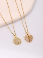 Gold hidden message necklace with sun or heart design engraved Good Girl