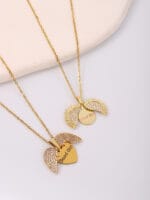 Gold hidden message necklace with sun or heart design engraved Good Girl