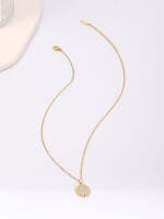 Gold hidden message necklace with sun or heart design engraved Good Girl