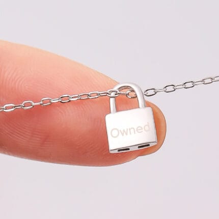 Padlock necklace gold with discreet symbolism. A su jewelry piece that hides in plain sight. Worn as a subtle day collar or as ownership symbol.