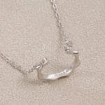 O-ring submissive necklace with hidden “Good Girl” engraving — a day collar and praise symbol designed for elegance and obedience.