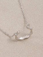 O-ring submissive necklace with hidden “Good Girl” engraving — a day collar and praise symbol designed for elegance and obedience.