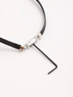 BDSM heart collar with triskelion back, leather band, and locking clasp — a discreet submissive collar blending devotion and pride for 24/7 ownership.