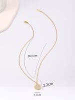 Gold hidden message necklace with sun or heart design engraved Good Girl