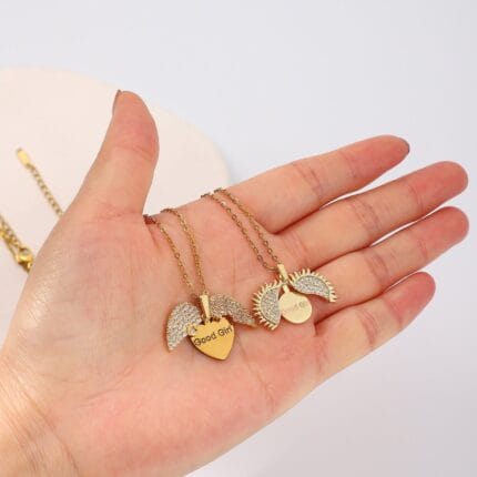 Gold hidden message necklace with sun or heart design engraved Good Girl