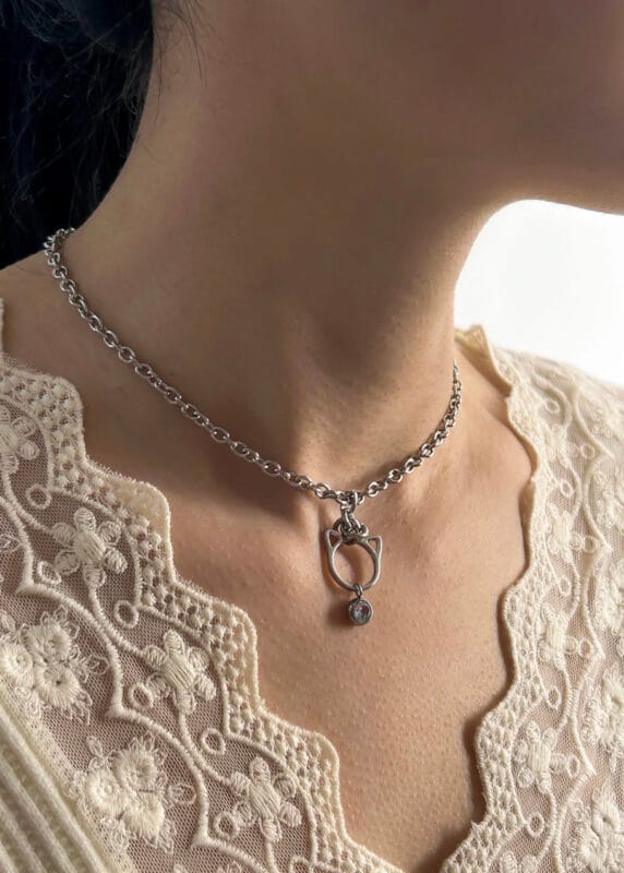 Petplay submissive necklace with kitten ears and hex lock transforms submission into daily devotion. Elegant, discreet, and locked with love.