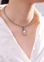 Stainless steel eternity collar necklace with pearl drop on submissive neck