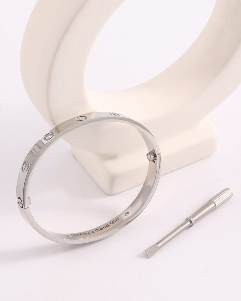 Stainless steel eternity bracelet with locking screw – a symbolic submissive bracelet and elegant BDSM jewelry cuff for daily wear.