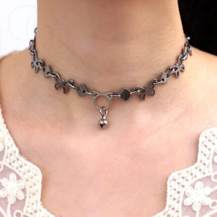 Lockable daily wear submissive collar with butterfly links, O-ring, and bell — a symbolic eternity collar and elegant BDSM jewelry.