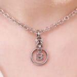 Lockable initial pendant collar with hex lock and stainless steel chain