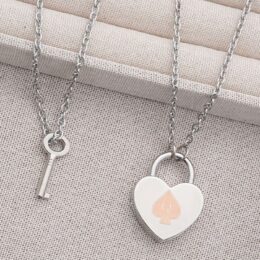 Hotwife Symbols Meaning - elegant anklet and key necklace symbolizing discreet hotwife meaning