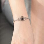 Triple O-ring submissive bracelet with black pearl and lockable hex lock