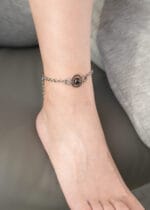 Triple O-ring submissive anklet with black pearl and engraved hex lock