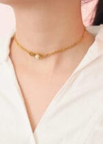 Gold triple O ring collar with pearl detail and lockable hex lock